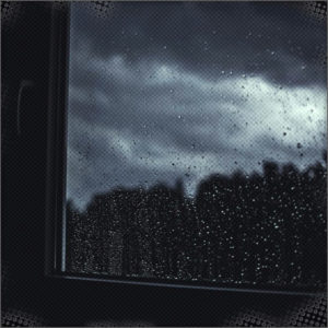 Storm is raging outside, rain covered window